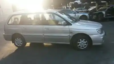 Véhicule à la ferraille kia joice ls de l'année 2001 alimenté g4cp