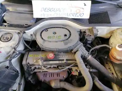 Véhicule à la ferraille renault   de l'année 1993 alimenté e7j