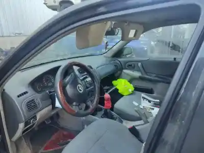 Scrapping Vehicle mazda 323 s vi (bj) 1.3 16v of the year 2003 powered 