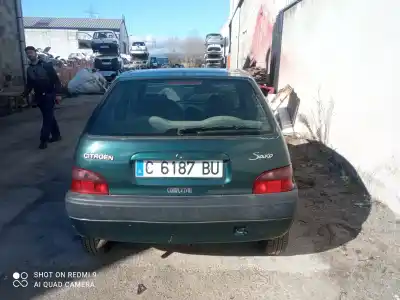 Sloopvoertuig citroen saxo mod 1.5 d - nº3672-lado izquierdo - oscuro - rojo con detalle. portalamparas regular van het jaar 1997 aangedreven 