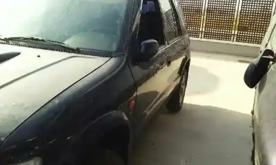Véhicule à la ferraille kia sportage td de l'année 1999 alimenté re