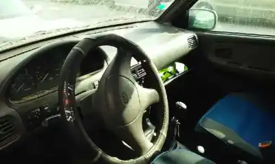 Véhicule à la ferraille kia sportage td de l'année 1999 alimenté re