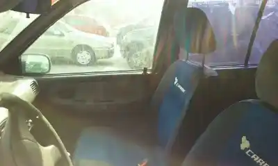 Véhicule à la ferraille kia sportage td de l'année 1999 alimenté re