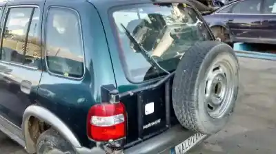 Véhicule à la ferraille kia sportage td de l'année 1999 alimenté re