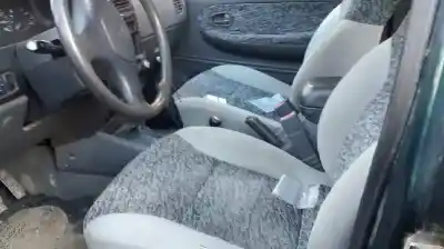 Véhicule à la ferraille kia sportage td de l'année 1999 alimenté re