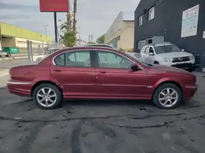 Здавання транспортного засобу jaguar x-type i (x400) 2.5 v6 a las 4 ruedas року 2003 потужний 