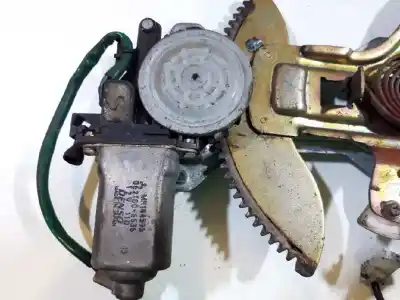 Автозапчастина б/у регулятор вікна передній лівий для mitsubishi l 200 (k6/7) 2.5 td cat посилання на oem iam   