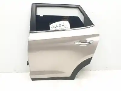 Recambio de automóvil de segunda mano de PUERTA TRASERA IZQUIERDA para HYUNDAI TUCSON  referencias OEM IAM 77003D7000 77003D7000 COLOR BLANCO PLAYA 1161CB 