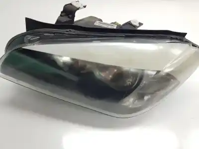 Tweedehands auto-onderdeel LINKER KOPLAMP voor BMW X1 (E84)  OEM IAM-referenties 63112990001  2990001