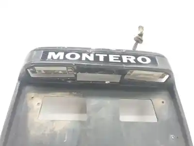 Автозапчастина б/у кріплення номерного знака для mitsubishi montero (v60/v70) 3.2 di-d avance посилання на oem iam mr416417  mr526992