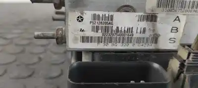 Автозапчастина б/у абс для jeep gr.cherokee (wj/wg) 3.1 td laredo посилання на oem iam p52128205ag  