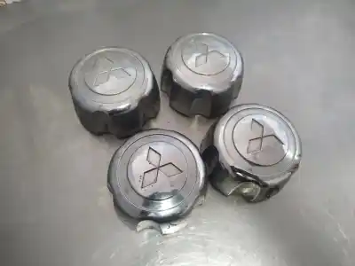Автозапчасти б/у колпачки ​​ступицы за mitsubishi l200 (k70) 4d56-td ссылки oem iam 085618bm  