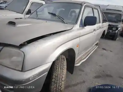 Автозапчасти б/у задняя левая дверь за mitsubishi l200 (k70) 4d56-td ссылки oem iam 