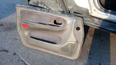 Pièce détachée automobile d'occasion GARNITURE DE PORTE AVANT GAUCHE pour SSANGYONG KORANDO OM662LA Références OEM IAM   