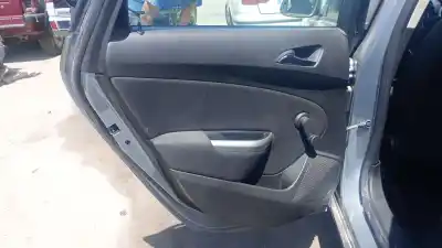 Tweedehands auto-onderdeel Bekleding Links Achterdeur voor OPEL ASTRA J BERLINA 5P A16XER OEM IAM-referenties   