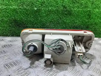 Автозапчастина б/у лампа бампера задній лівий для suzuki jimny sn (fj) cabrio jlx посилання на oem iam p1670  