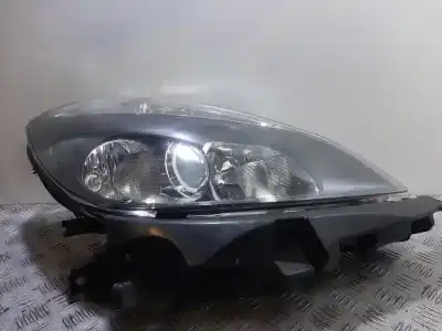 Second-hand car spare part right headlight for renault clio iii pack authentique oem iam references 7701061076  