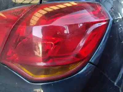 Автозапчастина б/у правий ліхтар для opel astra j lim. enjoy посилання на oem iam 