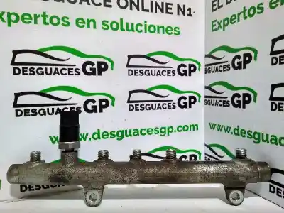 Recambio de automóvil de segunda mano de RAMPA INYECTORA para RENAULT MEGANE I FASE 2 CLASSIC (LA..)  referencias OEM IAM 7700111013  