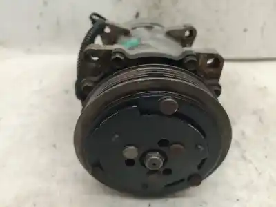 Pièce détachée automobile d'occasion Compresseur De Climatisation pour PEUGEOT 205 II (20A/C) 1.8 DIESEL Références OEM IAM SD7H157870  