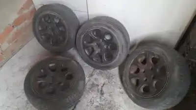 Recambio de automóvil de segunda mano de juego llantas para citroen saxo 1.6 vts referencias oem iam   