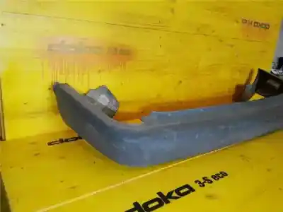 Pièce détachée automobile d'occasion pare-chocs arrière pour renault rapid/express (f40) 1.4 références oem iam 7700760880  