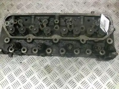 Pièce détachée automobile d'occasion culasse du moteur pour peugeot 505 berlina 2.5 diesel références oem iam 794010564 17950 