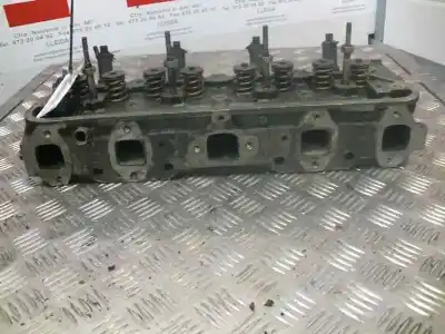 Pièce détachée automobile d'occasion culasse du moteur pour peugeot 505 berlina 2.5 diesel références oem iam 794010564 17950 