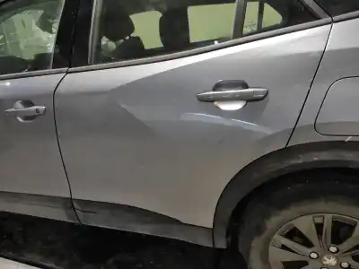 Pièce détachée automobile d'occasion porte arriere gauche pour peugeot 2008 1.5 blue hdi 75 kw références oem iam 9831048680 9825792780 98376409xt / gris kca - pintura gris artense 