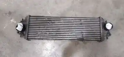 Pièce détachée automobile d'occasion INTERCOOLER / ÉCHANGEUR D'AIR pour OPEL VIVARO  Références OEM IAM 7700312903G  