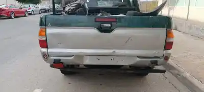 Автозапчасти б/у задняя дверь за mitsubishi l 200 (ka0/kb0) basis einzelkabine 2wd ссылки oem iam 