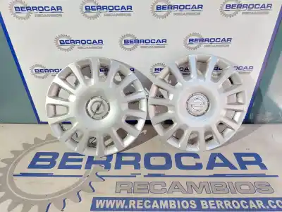 Recambio de automóvil de segunda mano de tapacubos para opel corsa e edition referencias oem iam 13211852 unidad  