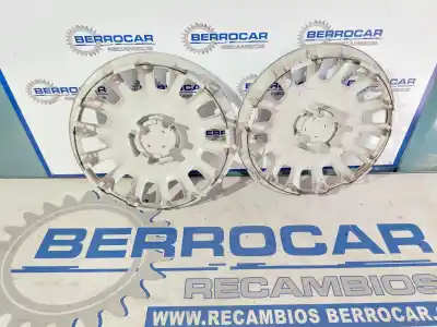 Recambio de automóvil de segunda mano de tapacubos para opel corsa e edition referencias oem iam 13211852 unidad  