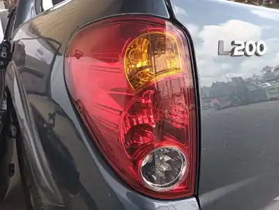 Автозапчастина б/у лівий ход ліхар для mitsubishi l 200 (ka0/kb0) cabina doble invite 4x4 посилання на oem iam 22016639  