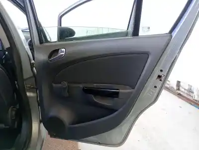 Автозапчасти б/у обивка задней правой двери за opel corsa d (s07) 1.2 (l08, l68) ссылки oem iam 13232907  