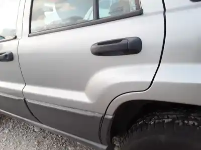 Автозапчасти б/у задняя левая дверь за jeep grand cherokee (wj/wg) d vm73b ссылки oem iam 