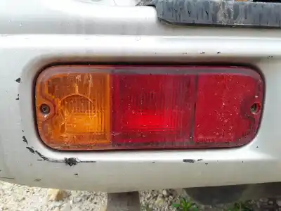 Tweedehands auto-onderdeel bumperlamp links achter voor suzuki grand vitara i (ft, ht) 2.0 td 4x4 (sq 420d) oem iam-referenties r2301l