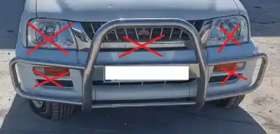 Tweedehands auto-onderdeel VOORBUMPER voor MITSUBISHI L 200 (K6/7) 2500 TD American Spirit OEM IAM-referenties   