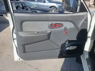 Peça sobressalente para automóvel em segunda mão FORRA / REVESTIMENTO DA PORTA DIANTEIRA ESQUERDA por MITSUBISHI L 200 (K6/7) 2500 TD American Spirit Referências OEM IAM   