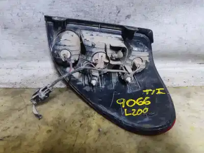 Автозапчасти б/у левый задний фонарь за mitsubishi l 200 (ka0/kb0) cabina doble intense 4x4 ссылки oem iam   estantería 144 b