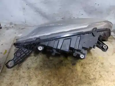 Second-hand car spare part left headlight for fiat doblo active oem iam references 10500748  estantería 36