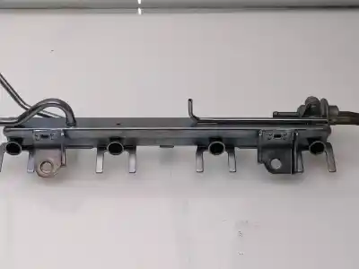 Автозапчастина б/у рампа инжектора для suzuki jimny sn (fj) 1.3 16v cat посилання на oem iam 1573054d00  