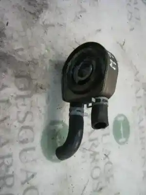 Pièce détachée automobile d'occasion refroidisseur radiateur d'huile du moteur pour voiture pour ford escort berl./turnier atlanta berlina références oem iam   