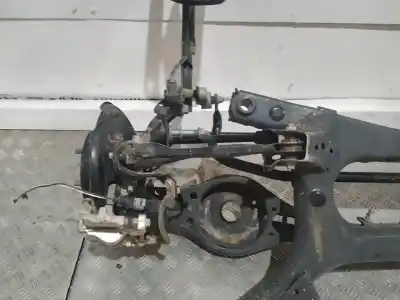 Peça sobressalente para automóvel em segunda mão charrió / suporte de eixo de trás por toyota corolla (e21) hybrid style 140 cv / 103 kw referências oem iam   n5.puente.suelo