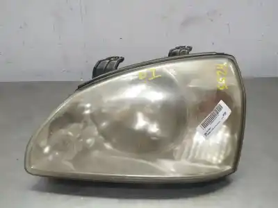 Second-hand car spare part left headlight for kia carens ii monospace (fj) 2.0 crdi oem iam references 