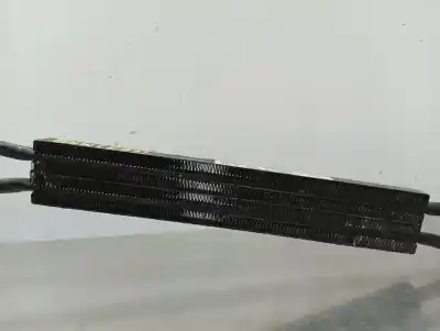 Peça sobressalente para automóvel em segunda mão Radiador De óleo por BMW SERIE X3 (E83) 2.0d [2.0 Ltr. - 110 kW 16V Diesel CAT] Referências OEM IAM 32262711711  