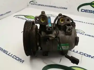 Pièce détachée automobile d'occasion COMPRESSEUR DE CLIMATISATION pour SSANGYONG MUSSO  Références OEM IAM 5062211521  