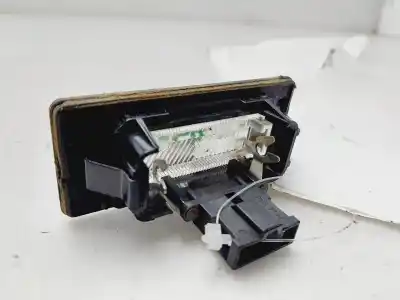 Second-hand car spare part licence plate light for skoda fabia combi (5j5) ambition 75 cv / 55 kw oem iam references 8t0943021