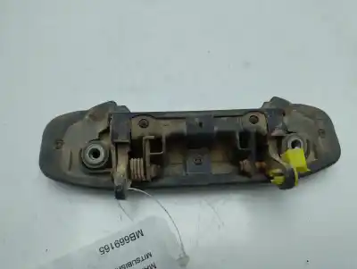 Автозапчасти б/у левая передняя наружная ручка за mitsubishi montero (v20/v40) 2800 td gls ссылки oem iam mb669165  