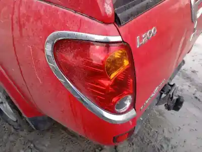 Автозапчасти б/у левый задний фонарь за MITSUBISHI L 200 (KA0/KB0) RAGING BULL ссылки OEM IAM   